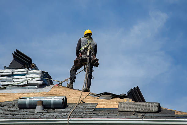 Professional Roofing technician working in Newton Center, MA